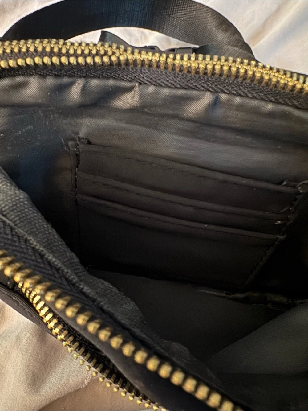 Black Crossbody Bag with Gold Zipper Pull by Zorfin